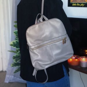 Gray and tan mini backpack